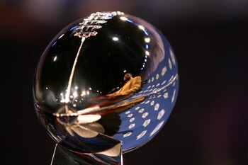 TAMPA, FL - JANUARY 30:  The reflection of head coach Mike Tomlin of the Pittsburgh Steelers is seen in the Vince Lombardi trophy during the AFC Head coach press conference prior to Super Bowl XLIII held at the Tampa Convention Center on January 30, 2009 