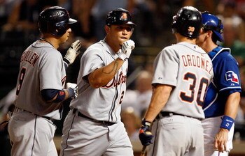 ARLINGTON, TX - JULY 29:  Miguel Cabrera #24 of the Detroit Tigers celebrates his three-run home run with Carlos Guillen #9 and Magglio Ordonez #30 during action against the Texas Rangers on July 29, 2009 at Rangers Ballpark in Arlington, Texas.  (Photo b