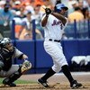 NEW YORK - JUNE 29: Carlos Delgado #21 of the New York Mets hits a solo home run in the third inning against the New York Yankees at Shea Stadium on June 29, 2008 in the Flushing neighborhood of the Queens borough of New York City.  (Photo by Jeff Zelevan
