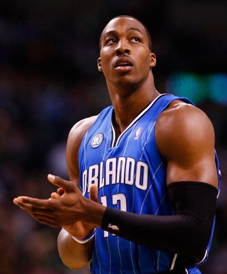 BOSTON, MA - MARCH 8:  Dwight Howard #12 of the Orlando Magic takes a breather during a game against the Boston Celtics at the TD Banknorth Garden on March 8, 2009 in Boston, Massachusetts. The Magic won 86-79. NOTE TO USER: User expressly acknowledges an