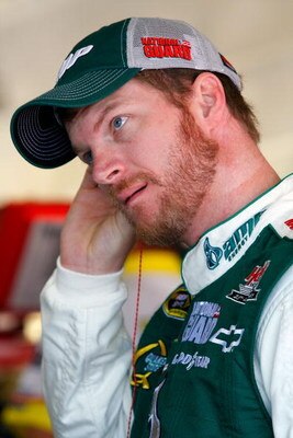 FORT WORTH, TX - APRIL 03:  Dale Earnhardt Jr., driver of the #88 National Guard/AMP Energy Chevrolet, stands in the garage area during practice for the NASCAR Sprint Cup Series Samsung 500 at Texas Motor Speedway on April 3, 2009 in Fort Worth, Texas.  (