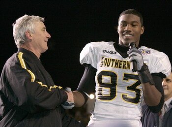LAFAYETTE, LA - DECEMBER 20: Head coach Jeff Bower (L) congratulates New Orleans Bowl MVP Shawn Nelson #83 (R) of Southern Miss after defeating Arkansas State 31-19 after The New Orleans Bowl on December 20, 2005 at Cajun Field in Lafayette, Louisiana.  T