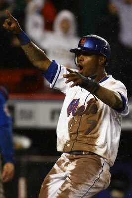 NEW YORK - SEPTEMBER 25:  Jose Reyes #7 of the Mets celebrates as he runs to home plate to score the winning run off a Carlos Beltran #15 base hit in the ninth inning against the Chicago Cubs during the MLB game against the Chicago Cubs at Shea Stadium Se