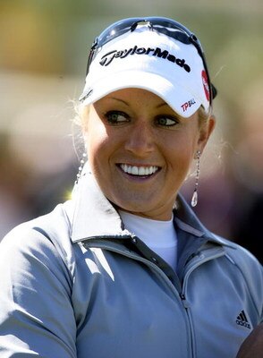 REUNION, FL - FEBRUARY 03:  Natalie Gulbis pauses between swings during the Annika Celebration 'Skins Game' at the Ginn Reunion Resort on February 3, 2009 in Reunion, Florida.  (Photo by Doug Benc/Getty Images)