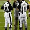 TAMPA, FL - FEBRUARY 01:  Head coach Mike Tomlin of the Pittsburgh Steelers argues with head linesman Derick Bowers #74 and referee Terry McAulay #77 against the Arizona Cardinals during Super Bowl XLIII on February 1, 2009 at Raymond James Stadium in Tam