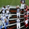 ATLANTA, GA - SEPTEMBER 7: NFL referee Ron Winter tosses the coin as the Atlanta Falcons host the Detroit Lions at the Georgia Dome on September 7, 2008 in Atlanta, Georgia.  (Photo by Al Messerschmidt/Getty Images) 