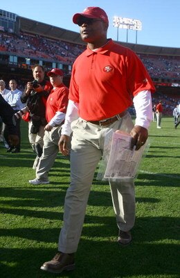 SAN FRANCISCO - OCTOBER 26:  San Francisco 49ers head coach Mike Singletary walks off the field following the game against the Seattle Seahawks at Candlestick Park on October 26, 2008 in San Francisco, California.  The Seahawks defeated the 49ers 34-13.  