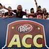 TAMPA, FL - DECEMBER 06:  Tech fans celebrate after the Virginia Tech Hokies score in the third quarter against the Boston College Eagles in the 2008 ACC Football Championship game at the Raymond James Stadium on December 6, 2008 in Tampa, Florida. Virgin