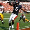 CHARLOTTESVILLE, VA - AUGUST 30:  Tailback Mikell Simpson #5 of the Virginia Cavaliers scores a touchdown against the Southern California Trojans during the game at Scott Stadium on August 30, 2008 in Charlottesville, Virginia.  (Photo by Kevin C. Cox/Get
