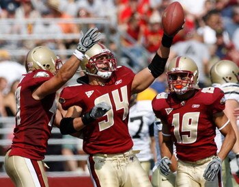 CHESTNUT HILL, MA - SEPTEMBER 22:  Linebacker Mark Herzlich of the Boston College Eagles celebrates his interception with teammates against the Army Black Knights at Alumni Stadium September 22, 2007 in Chestnut Hill, Massachusetts.  (Photo by Jim Rogash/