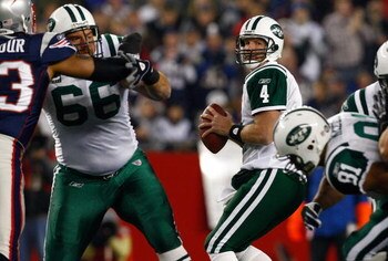 FOXBORO, MA - NOVEMBER 13:  Brett Favre #4 of the New York Jets prepares to throw a pass  against the New England Patriots at Gillette Stadium on November 13, 2008 in Foxboro, Massachusetts. The Jets won 34-31 in overtime. (Photo by Jim Rogash/Getty Image