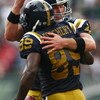 EAST RUTHERFORD, NJ - SEPTEMBER 28:  Jerricho Cotchery #89 of the New York Jets celebrates his touchdown with quarterback Brett Favre #4 against the Arizona Cardinals on September 28, 2008 at Giants Stadium in East Rutherford, New Jersey.  (Photo by Chris