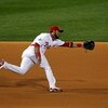 PHILADELPHIA - OCTOBER 27:  Pedro Feliz #7 of the Philadelphia Phillies can't reach a ball hit by B.J. Upton #2 the Tampa Bay Rays which short stop Jimmy Rollins did make a play on and threw on to first to force out Upton during the top of the fourth inni