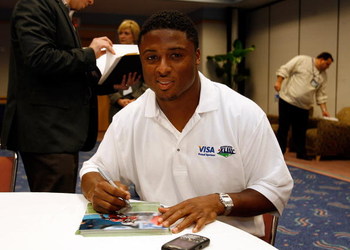 TAMPA, FL - JANUARY 26:  Running back Warrick Dunn of the Tampa Bay Buccaneers participates at the VISA 'Financial Football' Super Bowl at the Tampa Convention Center on January 26, 2009 in Tampa, Florida.  (Photo by J. Meric/Getty Images for VISA)