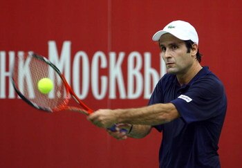 MOSCOW - OCTOBER 11:  Fabrice Santoro of France in action in his match against Igor Kunitsyn of Russia during day six of the Kremlin Cup Tennis at the Olympic Stadium on October 11, 2008 in Moscow, Russia.  (Photo by Julian Finney/Getty Images)