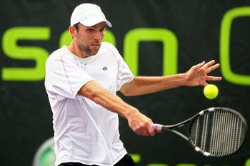 KEY BISCAYNE, FL - MARCH 28:  Ivo Karlovic of Croatia returns a shot against Frederico Gil of Portugal during day six of the Sony Ericsson Open at the Crandon Park Tennis Center on March 28, 2009 in Key Biscayne, Florida.  (Photo by Al Bello/Getty Images)