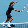 MELBOURNE, AUSTRALIA - JANUARY 14:  Roger Federer of Switzerland plays a backhand volley during his match against Carlos Moya of Spain during day one of the AAMI Classic at the Kooyong Lawn Tennis Club on January 14, 2009 in Melbourne, Australia.  (Photo 