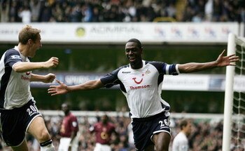 LONDON - OCTOBER 29:  Ledley King the Tottenham Captain celebrates after scoring the opening goal during the Barclays Premiership match between Tottenham Hotspur and Arsenal at White Hart Lane on October 29, 2005 in London, England.  (Photo by Shaun Botte