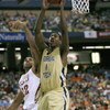 ATLANTA - MARCH 13: Iman Shumpert #1 of the Georgia Tech Yellow Jackets puts a shot up against the Florida State Seminoles during day two of the 2009 ACC Men's Basketball Tournament on March 13, 2009 at the Georgia Dome in Atlanta, Georgia.  (Photo by Kev