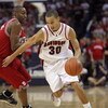 CHARLOTTE, NC - DECEMBER 6:  Stephen Curry #30 of the Davidson Wildcats drives during the game against the North Carolina State Wolfpack at Time Warner Cable Arena on December 6, 2008 in Charlotte, North Carolina. (Photo by Streeter Lecka/Getty Images)