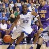 LEXINGTON, KY - FEBRUARY 28:  Jodie Meeks #23 of the Kentucky Wildcats drives to the basket against Garrett Temple #14 of the LSU Tigers during the SEC game at Rupp Arena on February 28, 2009 in Lexington, Kentucky.  (Photo by Andy Lyons/Getty Images)