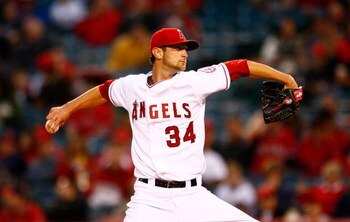 ANAHEIM, CA - APRIL 08: Nick Adenhart #34 of the Los Angeles Angels of Anaheim throws a pitch against the Oakland Athletics at Angel Stadium on April 8, 2009 in Anaheim, California. The Athletics defeated the Angels 6-4. (Photo by Jeff Gross/Getty Image