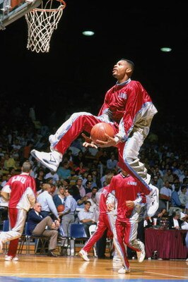 1990:  Hank Gathers #44  of the Loyola  Marymount Lions drives to the basket for a left handed throught the legs layup during warmups in 1990. Hank Gathers was one of the nation's top college basketball players in the late 1980's and early 1990's before c
