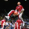 1990:  Hank Gathers #44  of the Loyola  Marymount Lions drives to the basket for a left handed throught the legs layup during warmups in 1990. Hank Gathers was one of the nation's top college basketball players in the late 1980's and early 1990's before c