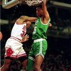 CHICAGO - DECEMBER 18:  Reggie Lewis of the Boston Celtics makes a slam dunk during the NBA game against the Chicago Bulls in the United Center on December 18, 1993 in Chicago, Illinois. NOTE TO USER: User expressly acknowledges and agrees that, by downlo