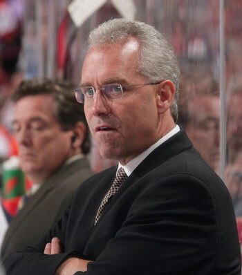 PHILADELPHIA - SEPTEMBER 29:  Head Coach Tom Renney of the New York Rangers watches the play from the bench in a NHL game against the Philadelphia Flyers on September 29, 2007 at the Wachovia Center in Philadelphia, Pennsylvania. The Rangers defeated the 