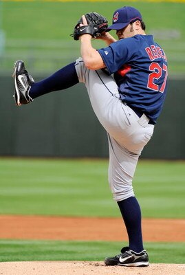 SURPRISE, AZ - MARCH 03:  Pitcher Anthony Reyes #27 the Cleveland Indians warms up against the Kansas City Royals before the start of a spring training game against  at the Surprise Stadium on March 3, 2009 in Surprise, Arizona.  (Photo by Kevork Djansezi