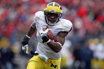 COLUMBUS, OH - NOVEMBER 22:  Brandon Minor #4 of the Michigan Wolverine sruns with the ball during the Big Ten Conference game against the Ohio State Buckeyes at Ohio Stadium on November 22, 2008 in Columbus, Ohio.  (Photo by Andy Lyons/Getty Images)
