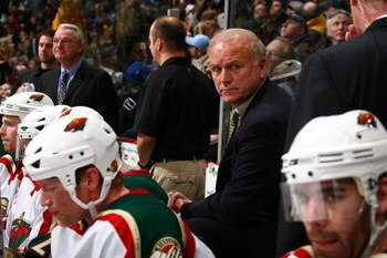 VANCOUVER, BC - DECEMBER 16:  Head coach Jacques Lemaire of the Minnesota Wild looks on against the Vancouver Canucks at General Motors Place on December 16, 2006 in Vancouver, British Columbia, Canada. The Canucks won 2-1.  (Photo by Jeff Vinnick/Getty I