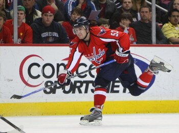 WASHINGTON - MARCH 27:  Mike Green #52 of the Washington Capitals takes the shot against the Tampa Bay Lightning on March 27, 2009 at the Verizon Center in Washington, D.C. The Capitals defeated the Lightning 5-3.  (Photo by Bruce Bennett/Getty Images)