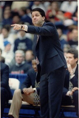 18 JAN 1994:  UNIVERSITY OF MASSACHUSETTS COACH JOHN CALIPARI POINTS OUT DIRECTIONS TO HIS PLAYERS DURING A NON-CONFERENCE GAME WITH THE DEPAUL BLUE DEMONS.
