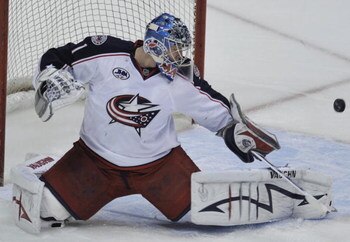 VANCOUVER, CANADA - MARCH 1:  Steve Mason #1 of the Columbus Blue Jackets deflects a shot during their game against the Vancouver Canucks at General Motors Place March 1, 2009 in Vancouver, Canada.   (Photo by Nick Didlick/Getty Images)