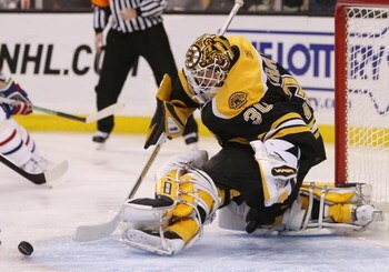 BOSTON - JANUARY 13:  Tim Thomas #30 of the Boston Bruins stops a shot in the third period against the Montreal Canadiens on January 13, 2009 at the TD Banknorth Garden in Boston, Massachusetts. The Bruins defeated the Canadiens 3-1.  (Photo by Elsa/Getty