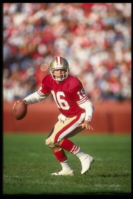 28 Oct 1990: Quarterback Joe Montana of the San Francisco 49ers looks down field for an open receiver as he drops back to pass during a play in the 49ers 20-17 victory over the Cleveland Browns at Candlestick Park in San Francisco, California.