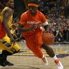 MILWAUKEE - MARCH 07: Jonny Flynn #10 of the Syracuse Orange drives around Jerel McNeal #22 of the Marquette Golden Eagles on March 7, 2009 at the Bradley Center in Milwaukee, Wisconsin. Syracuse defeated Marquette 86-79 in overtime. (Photo by Jonathan Da