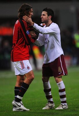 MILAN, ITALY - MARCH 04:  Paolo Maldini of AC Milan congratulates Cesc Fabregas of Arsenal after the UEFA Champions League 1st knockout round 2nd leg match between AC Milan and Arsenal at the San Siro stadium on March 4, 2008 in Milan, Italy.  (Photo by S