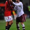 MILAN, ITALY - MARCH 04:  Paolo Maldini of AC Milan congratulates Cesc Fabregas of Arsenal after the UEFA Champions League 1st knockout round 2nd leg match between AC Milan and Arsenal at the San Siro stadium on March 4, 2008 in Milan, Italy.  (Photo by S