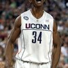 DETROIT - APRIL 04:  Hasheem Thabeet #34 of the Connecticut Huskies reacts after he scored a basket in the first half against the Michigan State Spartans during the National Semifinal game of the NCAA Division I Men's Basketball Championship at Ford Field