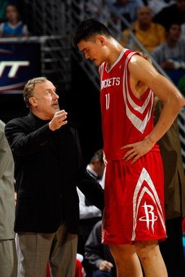 NEW ORLEANS - DECEMBER 26:  Head coach Rick Adelman talks with Yao Ming #11of the Houston Rockets during the game against the New Orleans Hornets on December 26, 2008 at the New Orleans Arena in New Orleans, Louisiana.  NOTE TO USER: User expressly acknow
