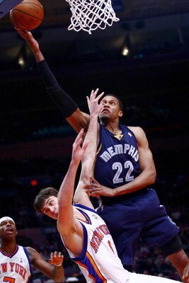 NEW YORK - JANUARY 23:  Rudy Gay #22 of the Memphis Grizzlies drives over Danilo Gallinari #8 and Quentin Richardson #23 of the New York Knicks at Madison Square Garden January 23, 2009 in New York City. NOTE TO USER: User expressly acknowledges and agree