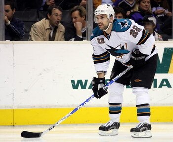 LOS ANGELES, CA - DECEMBER 15:  Dan Boyle #22 of the San Jose Sharks skates up the a face off during the NHL game against the Los Angeles Kings at Staples Center on December 15, 2008 in Los Angeles, California.  The Sharks defeated the Kings 3-2 in overti