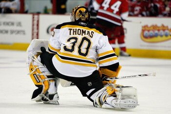 RALEIGH, NC - FEBRUARY 17:  Tim Thomas #30 of the Boston Bruins looks on during the game against the Carolina Hurricanes on February 17, 2009 at RBC Center in Raleigh, North Carolina.  (Photo by Kevin C. Cox/Getty Images)