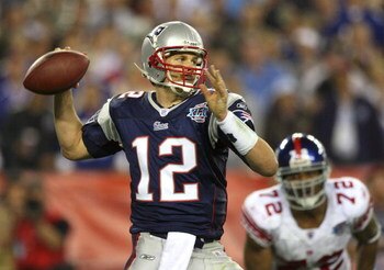 GLENDALE, AZ - FEBRUARY 03:  Quarterback Tom Brady #12 of the New England Patriots drops back to pass against the New York Giants the second half of Super Bowl XLII on February 3, 2008 at the University of Phoenix Stadium in Glendale, Arizona. The Giants 