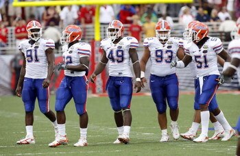 OXFORD, MS - SEPTEMBER 22: Derrick Harvey #91, Dustin Doe #32, Jermaine Cunningham #49, Javier Estopinan #93 and Brandon Spikes #51 of the Florida Gators get set on defense against the Mississippi Rebels on September 22, 2007 at Vaught-Hemingway Stadium/H