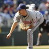 KANSAS CITY, MO - APRIL 15:  Kerry Wood of the Cleveland Indians, wearing a #42 jersey during the Jackie Robinson Day game throws a pitch in the ninth inning against the Kansas City Royals on April 15, 2009 at Kauffman Stadium in Kansas City, Missouri.  (