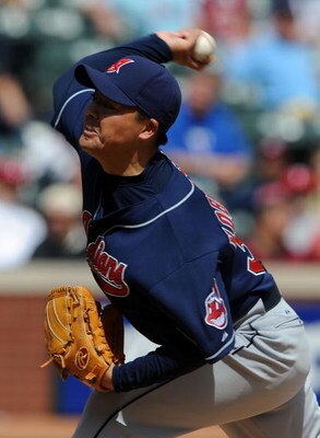 ARLINGTON, TX - APRIL 09:  Pitcher Masa Kobayashi #30 of the Cleveland Indians throws against the Texas Rangers on April 9, 2009 at Rangers Ballpark in Arlington, Texas.  (Photo by Ronald Martinez/Getty Images)